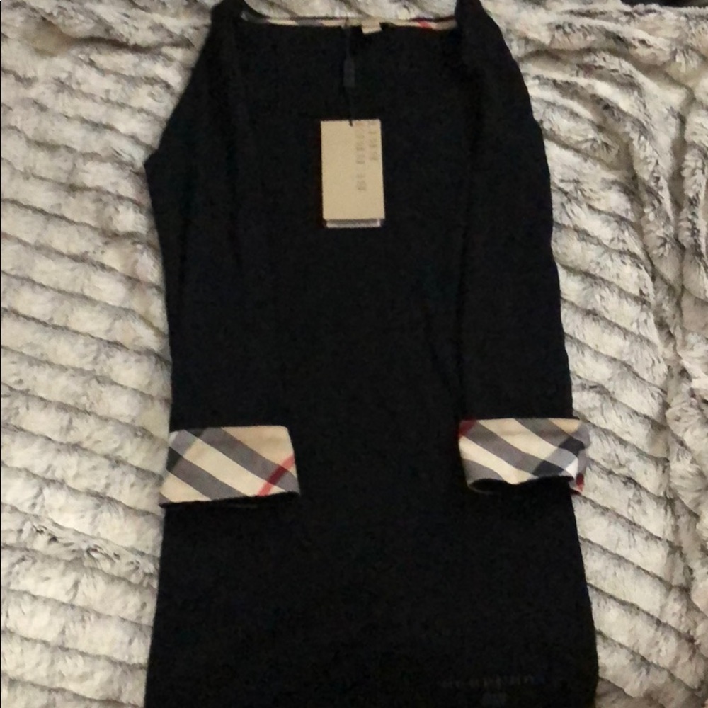 BURBERRY long sleeved black top with cuffs. BNWT